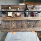 Rustic Reclaimed Wood Liquor and Wine Shelf with Pipe Construction: Handcrafted for Home Bar & Stemware Storage