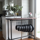 Kitchen with hanging pan rack on a wooden table