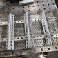11" x 17" wood pellet insert in a perforated metal basket from a slight angle