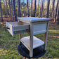 Farmhouse barnwood nightstand with an open drawer and lower shelf; light distressed finish for a country rustic bedroom.